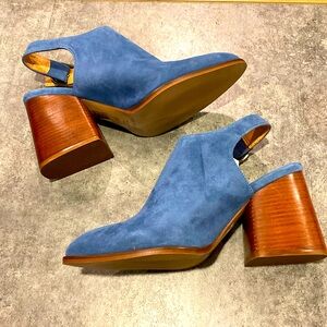 Blue suede block heels.